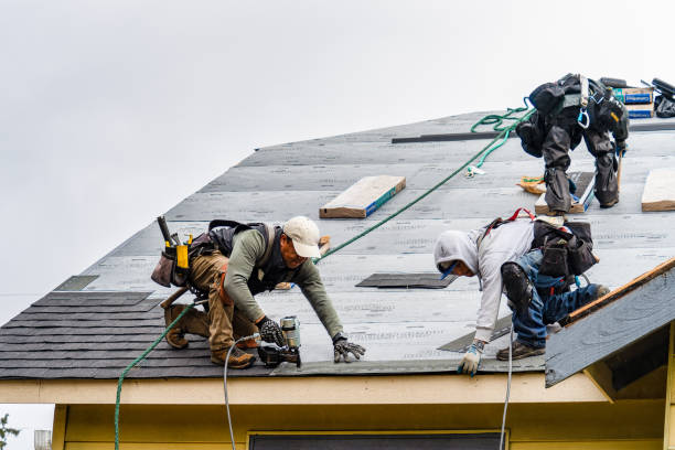 Professional Storm Damage Roof Repair technician working in Ocean Beach, NY